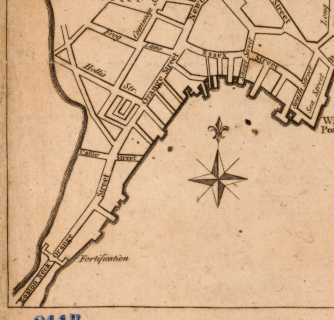 Monochrome map detail with Essex Street near the top, Orange Street along a narrow strip extending down the left, a Fortification label near its lower end, and a compass in the open area to the right. Heavy boundaries flank the strip.